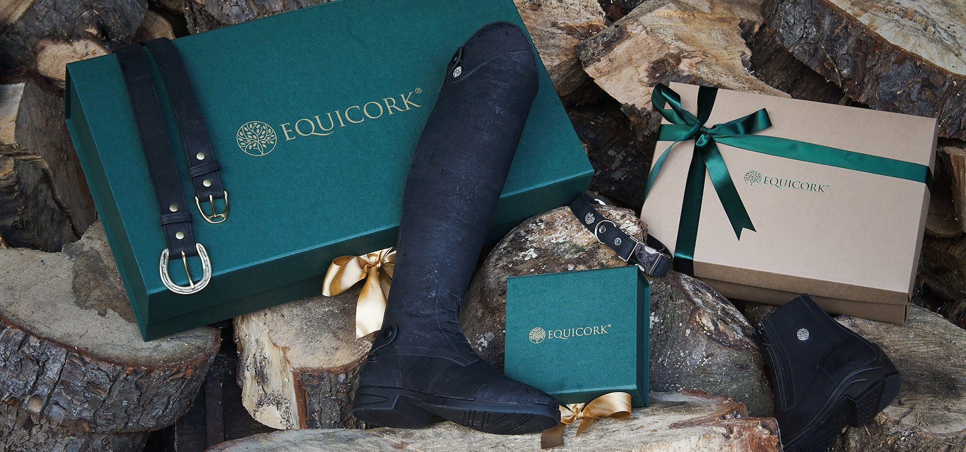 Eco friendly boots and packaging with the ladies belt range displayed on a wooden background 